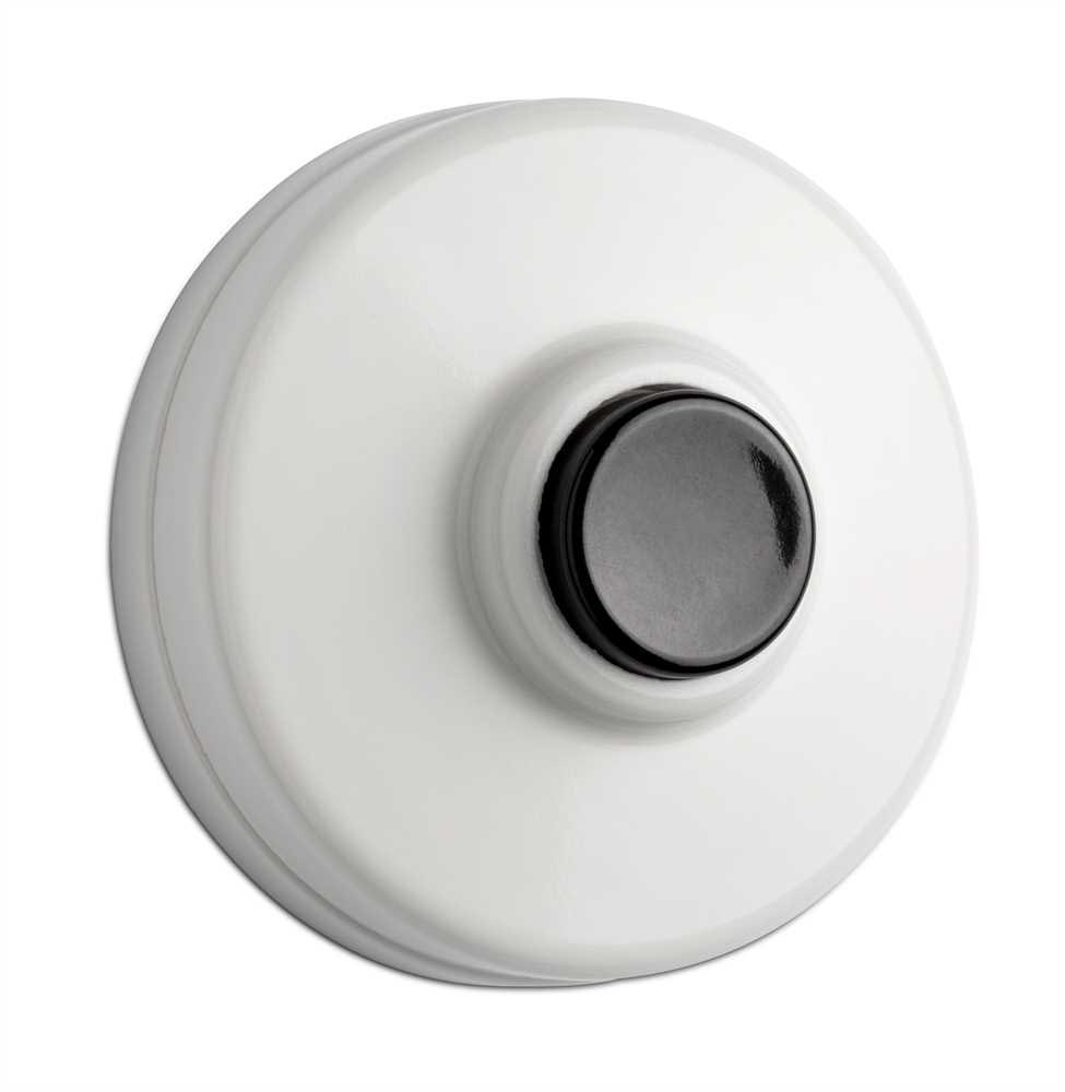 Ringledningsbeslag i vit duroplast med svart knapp (bild för) Ringledningsbeslag i vit duroplast med svart knapp